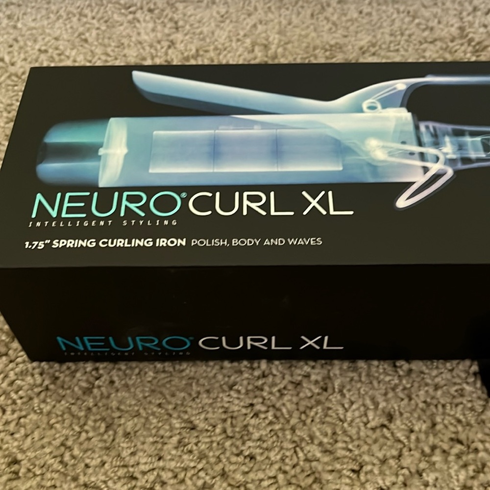 Paul Mitchell Neuro Curl XL 1.75 inch curling iron.